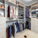 Custom Closet in Grey with Drawers and Hanging Rods in Baton Rouge, LA