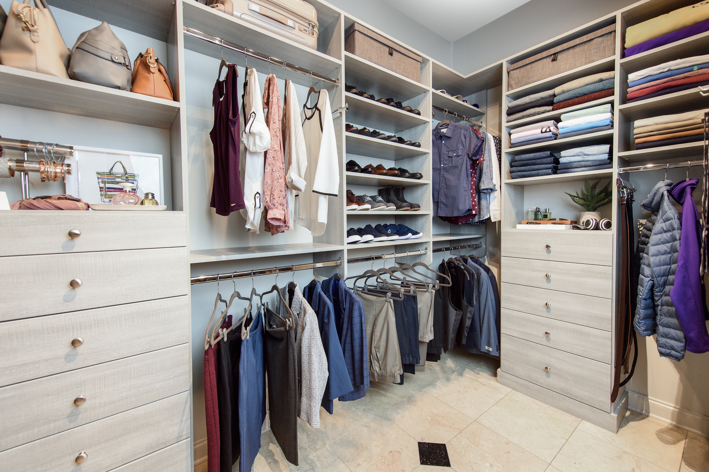 Custom Closet in Grey with Drawers and Hanging Rods in Baton Rouge, LA