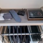 Custom pant storage in a floor mount boutique closet in Naples, FL