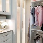 Custom built in storage and hanging racks for a boutique closet in Naples, FL