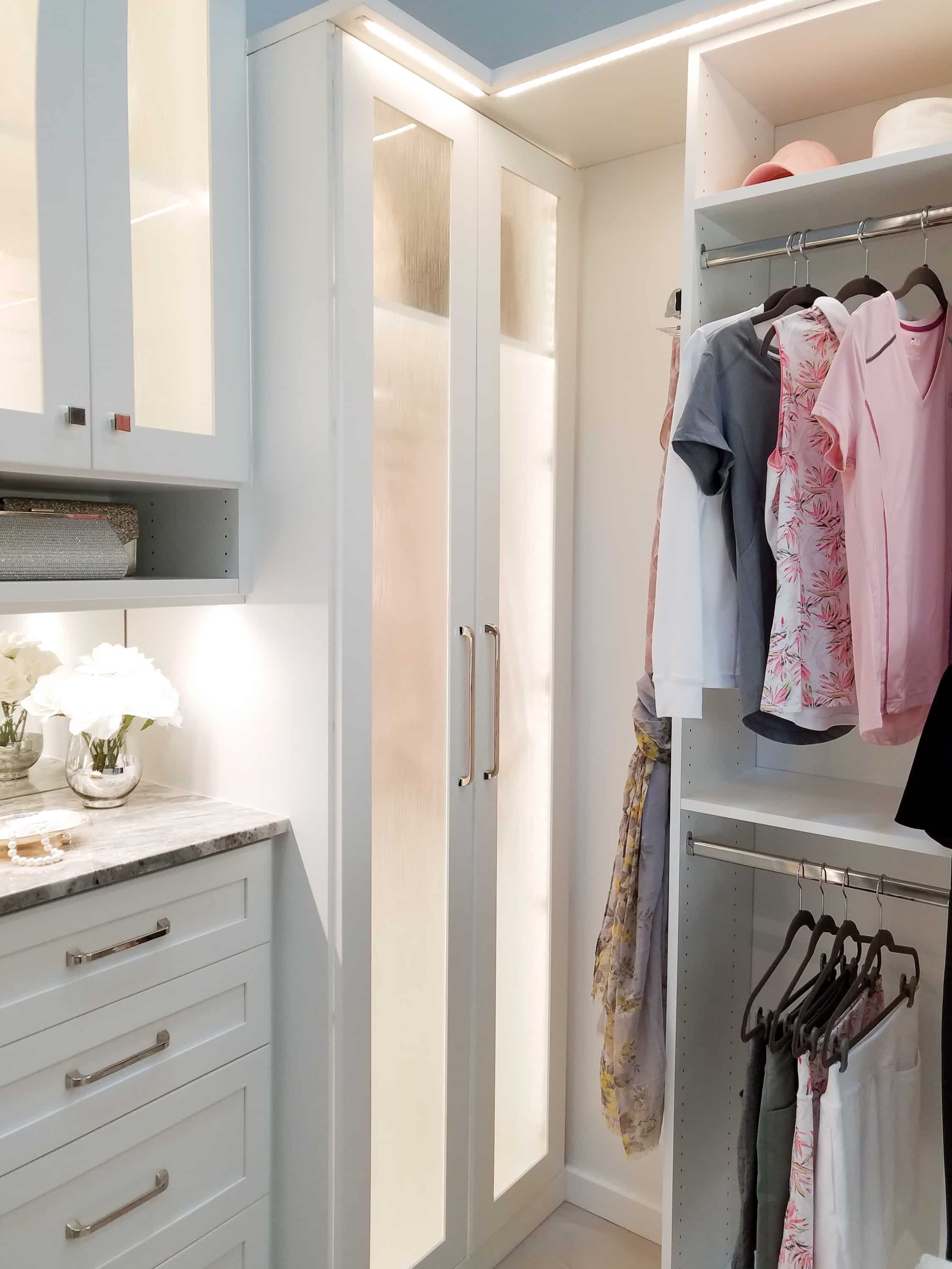 Custom built in storage and hanging racks for a boutique closet in Naples, FL