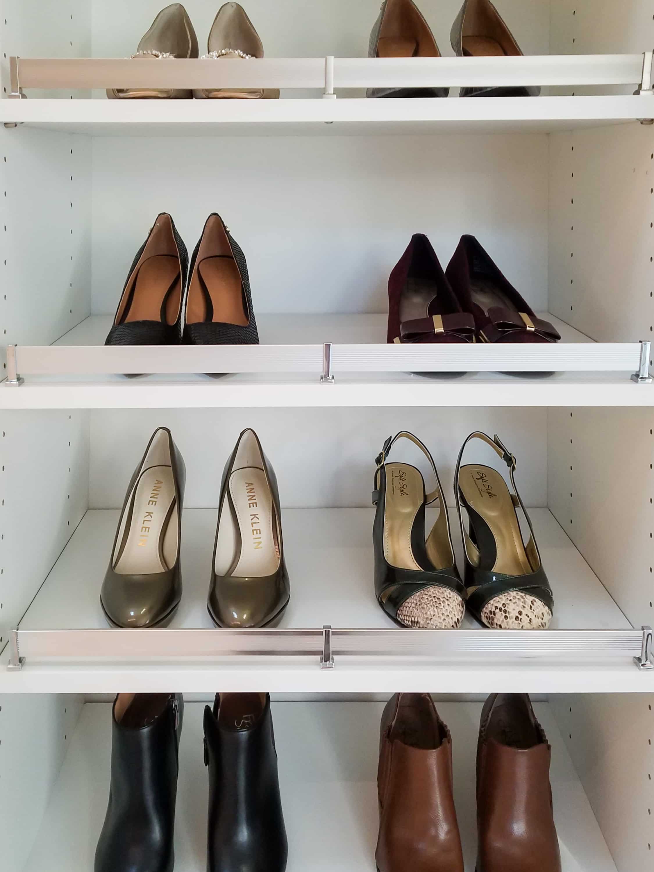 Women's shoes on shelves in closet